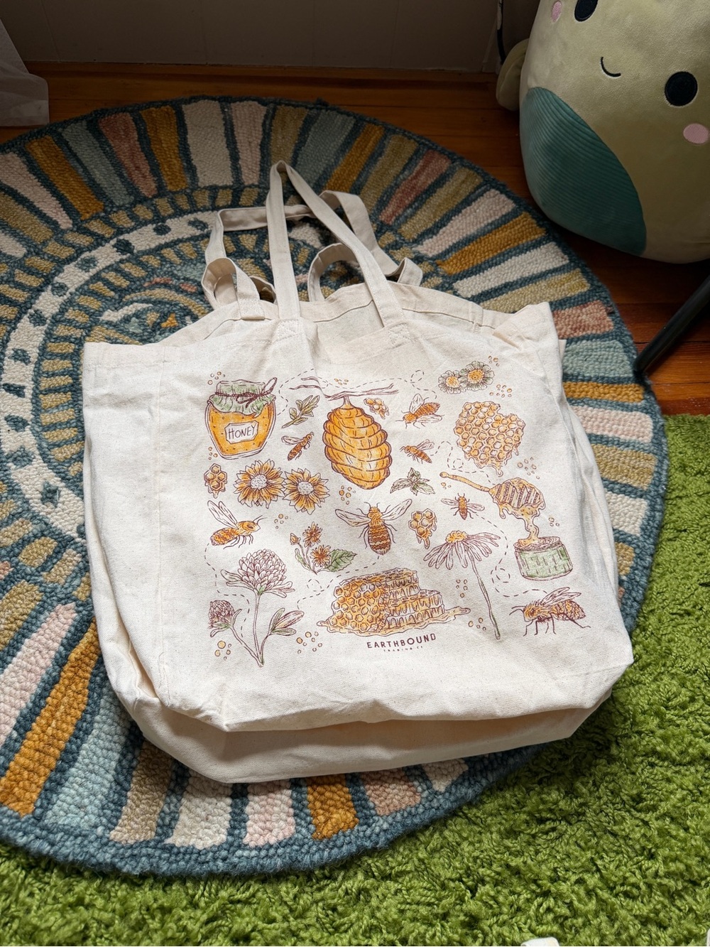 EARTHBOUND Cream Canvas Tote with Yellow & Brown Honeybee Illustration